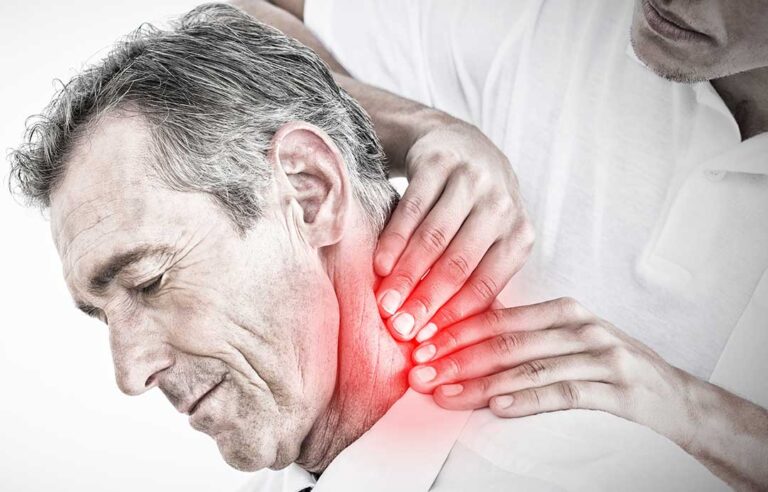 A chiropractor gently adjusting an adult client's upper back in a quiet wellness clinic setting.
